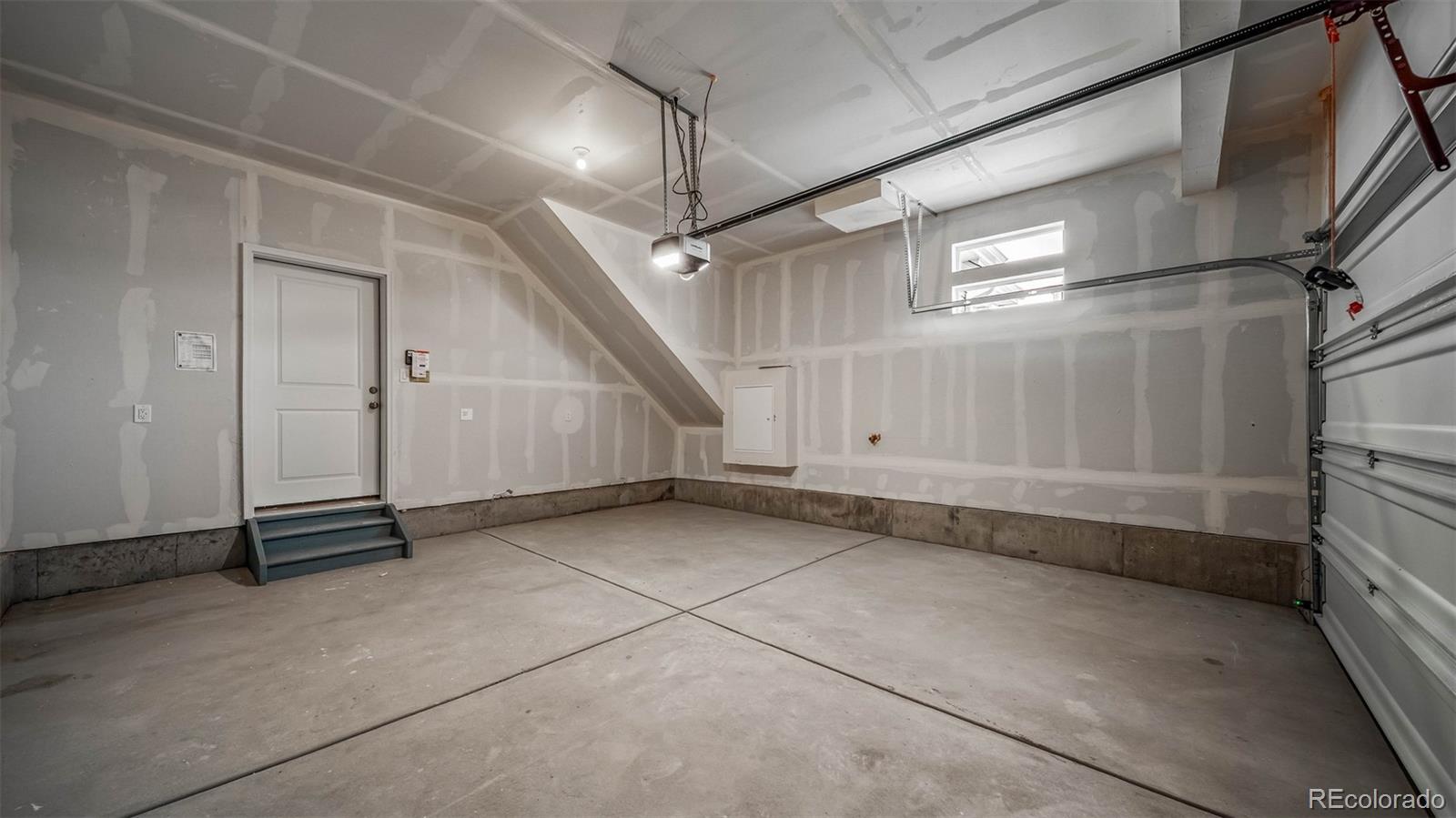 3970 North Rome Street Aurora, CO 80019 - Photo 9 of 22 a view of a garage