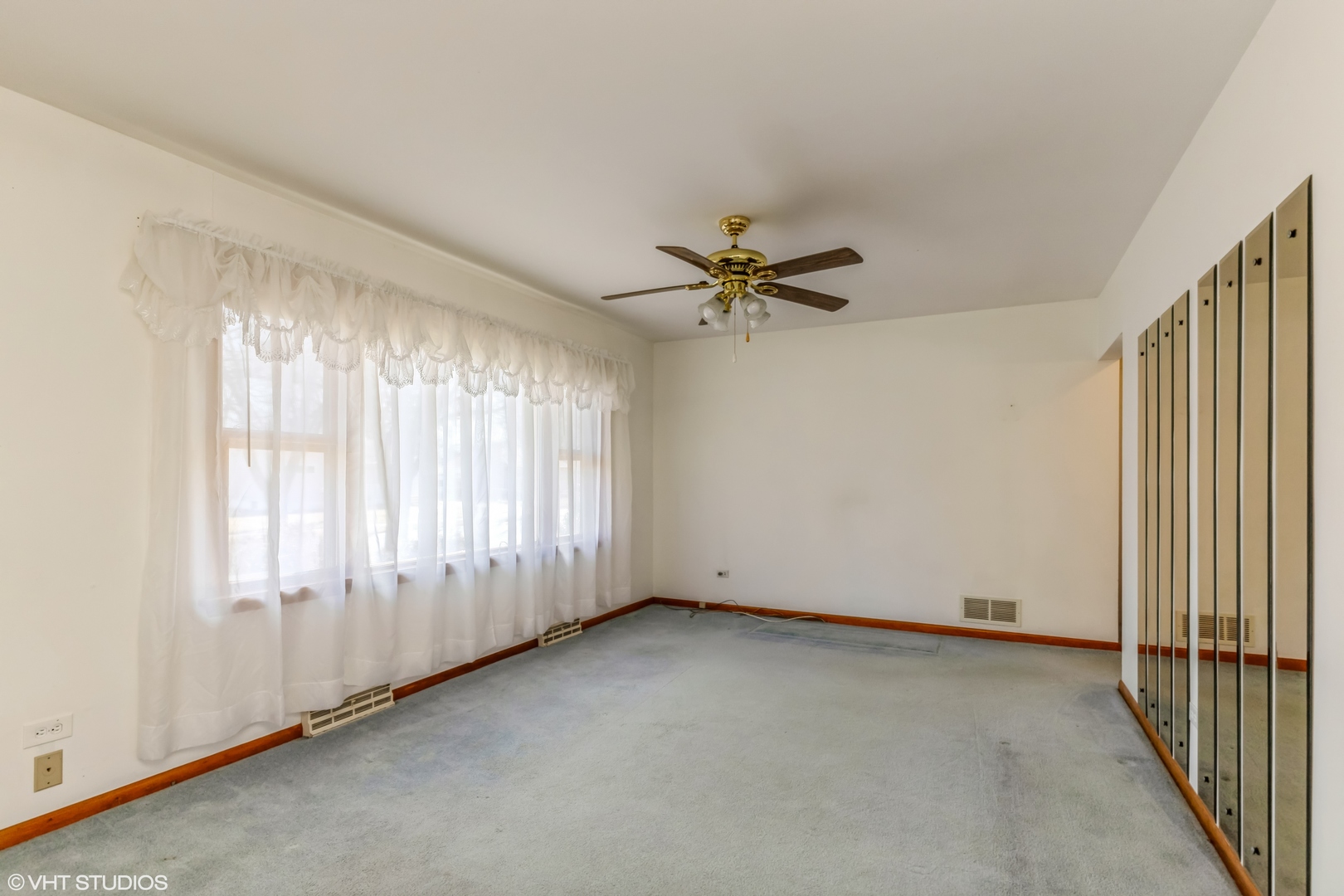 2044 Delaware Road Waukegan, IL 60087 - Photo 3 of 14 a view of an empty room with a window