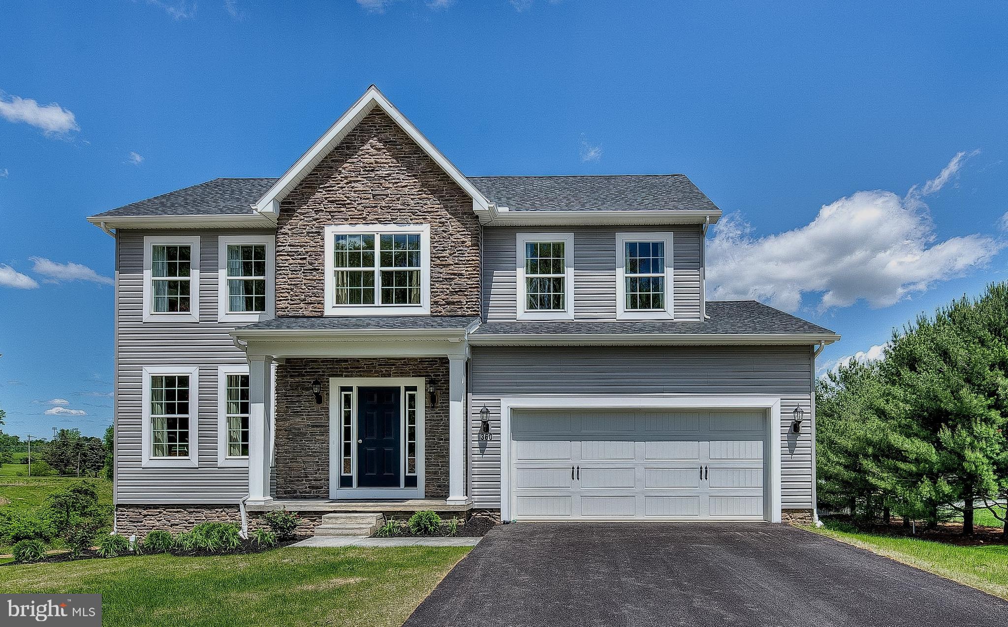 102 Piedmont Way, Unit 139 Hanover, PA 17331 - Photo 1 of 27 front view of a house with a yard