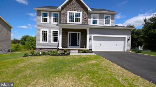 102 Piedmont Way, Unit 139 Hanover, PA 17331 - Photo 2 of 27 a front view of house with yard