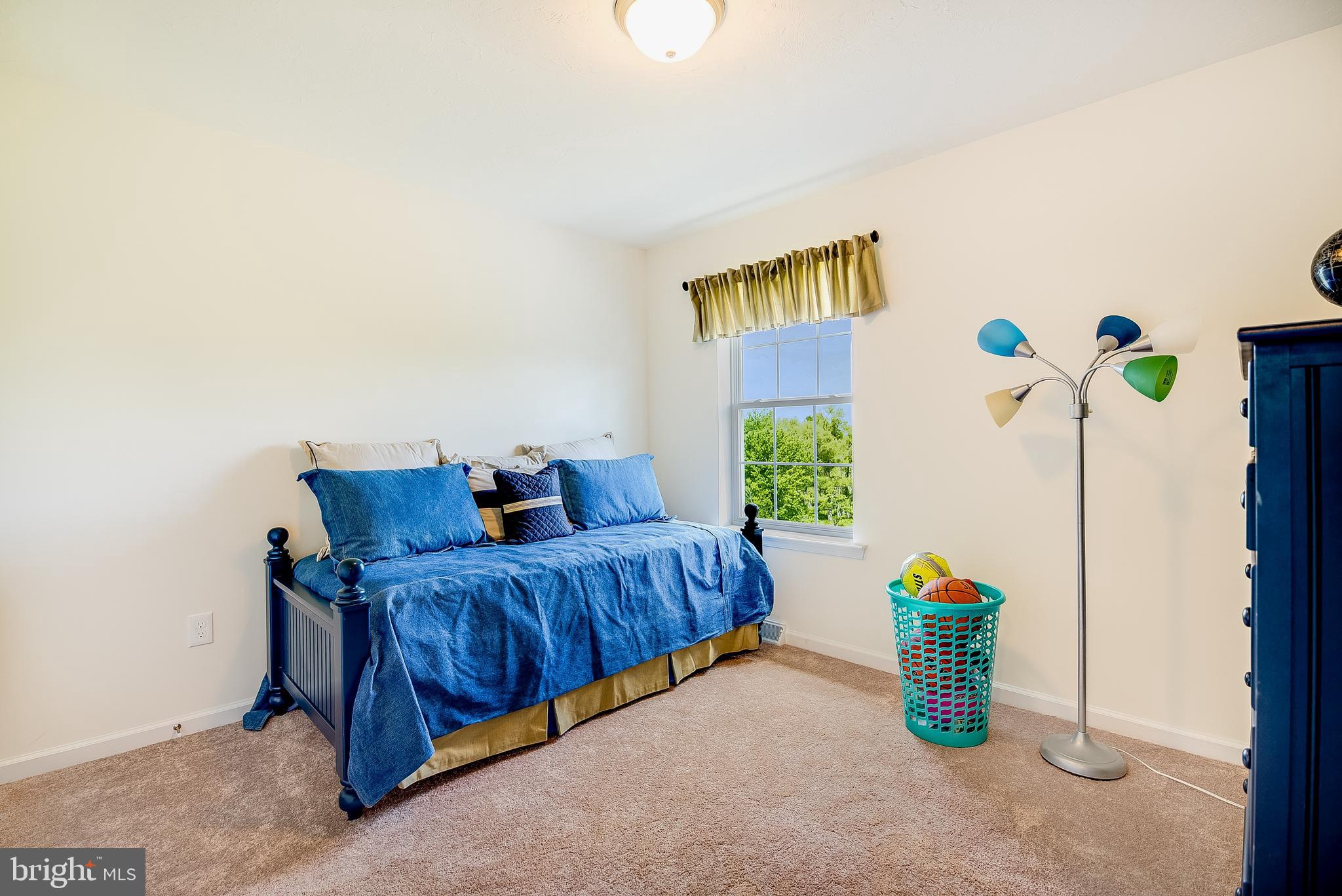 102 Piedmont Way, Unit 139 Hanover, PA 17331 - Photo 22 of 27 a living room with furniture and a window