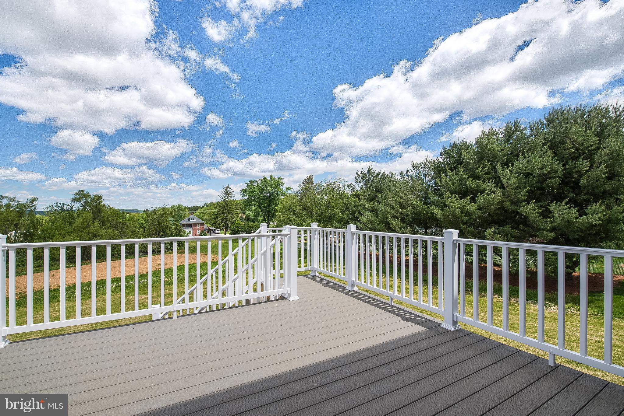 102 Piedmont Way, Unit 139 Hanover, PA 17331 - Photo 24 of 27 a view of balcony with wooden floor and fence