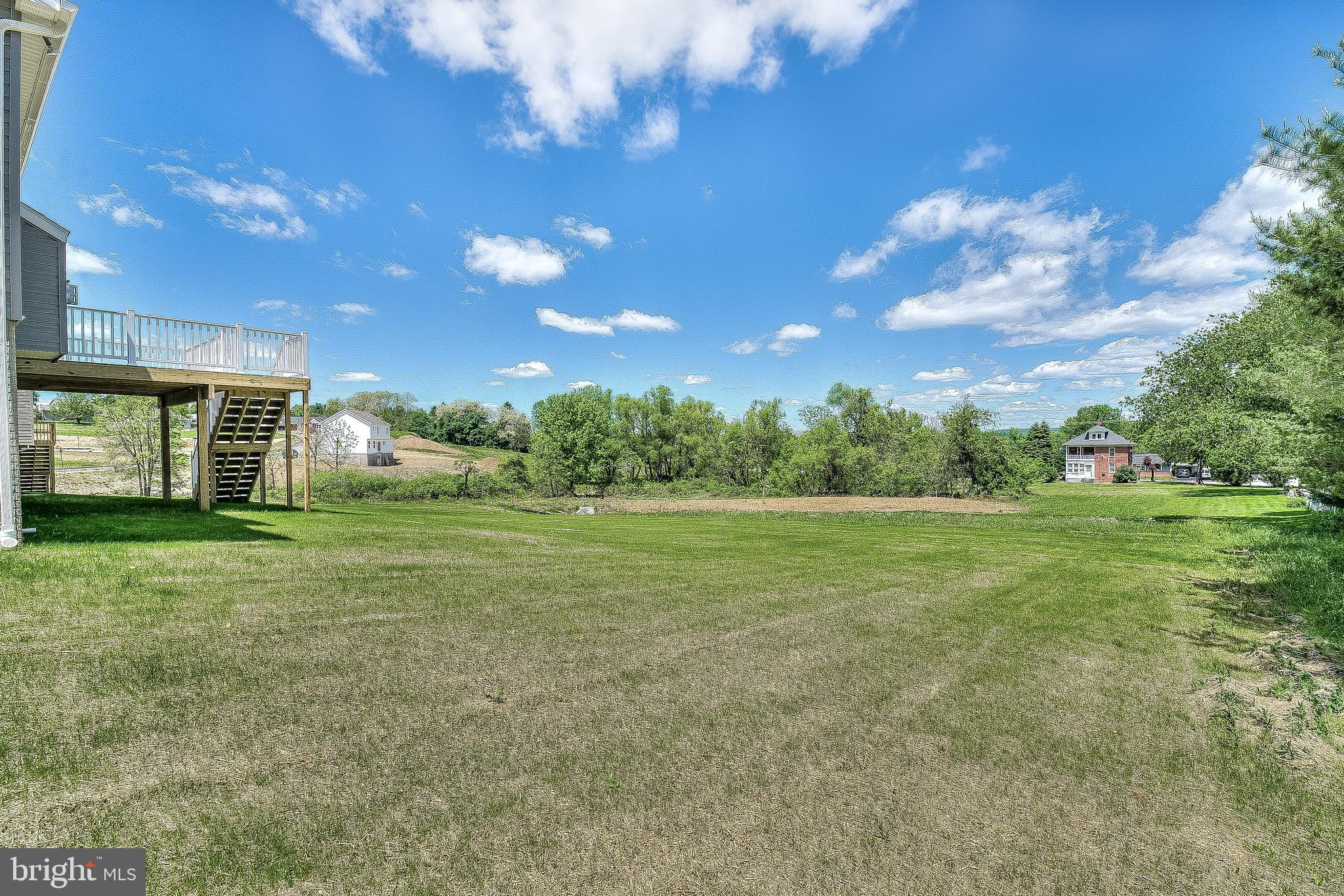 102 Piedmont Way, Unit 139 Hanover, PA 17331 - Photo 27 of 27 a view of a house with a big yard
