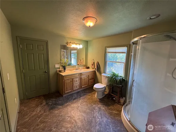 a room with a sink and a mirror