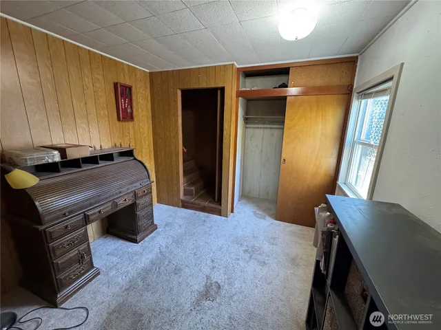 a view of a hallway with workspace