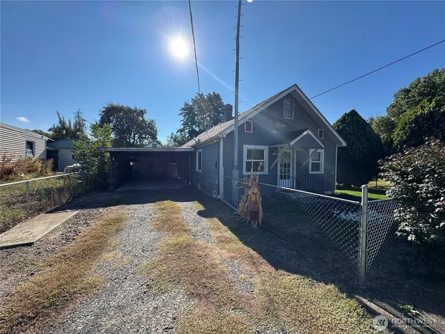 a house view with a garden space