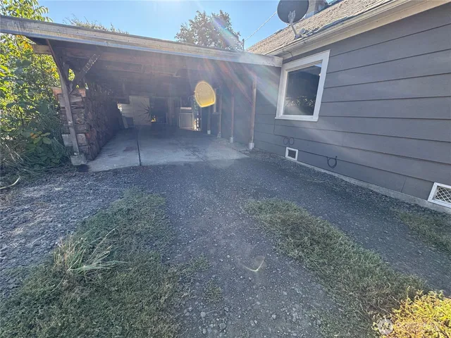 a view of a back yard of the house