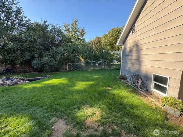 a view of a backyard with a garden
