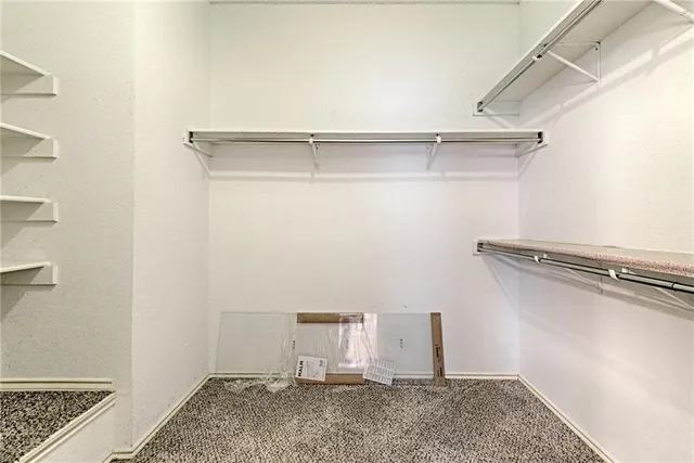 a view of a room with racks on the wall