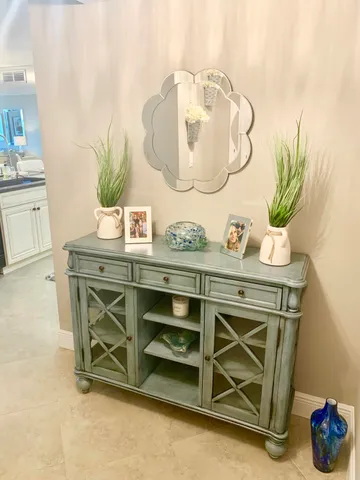 a bedroom with bed and a couch