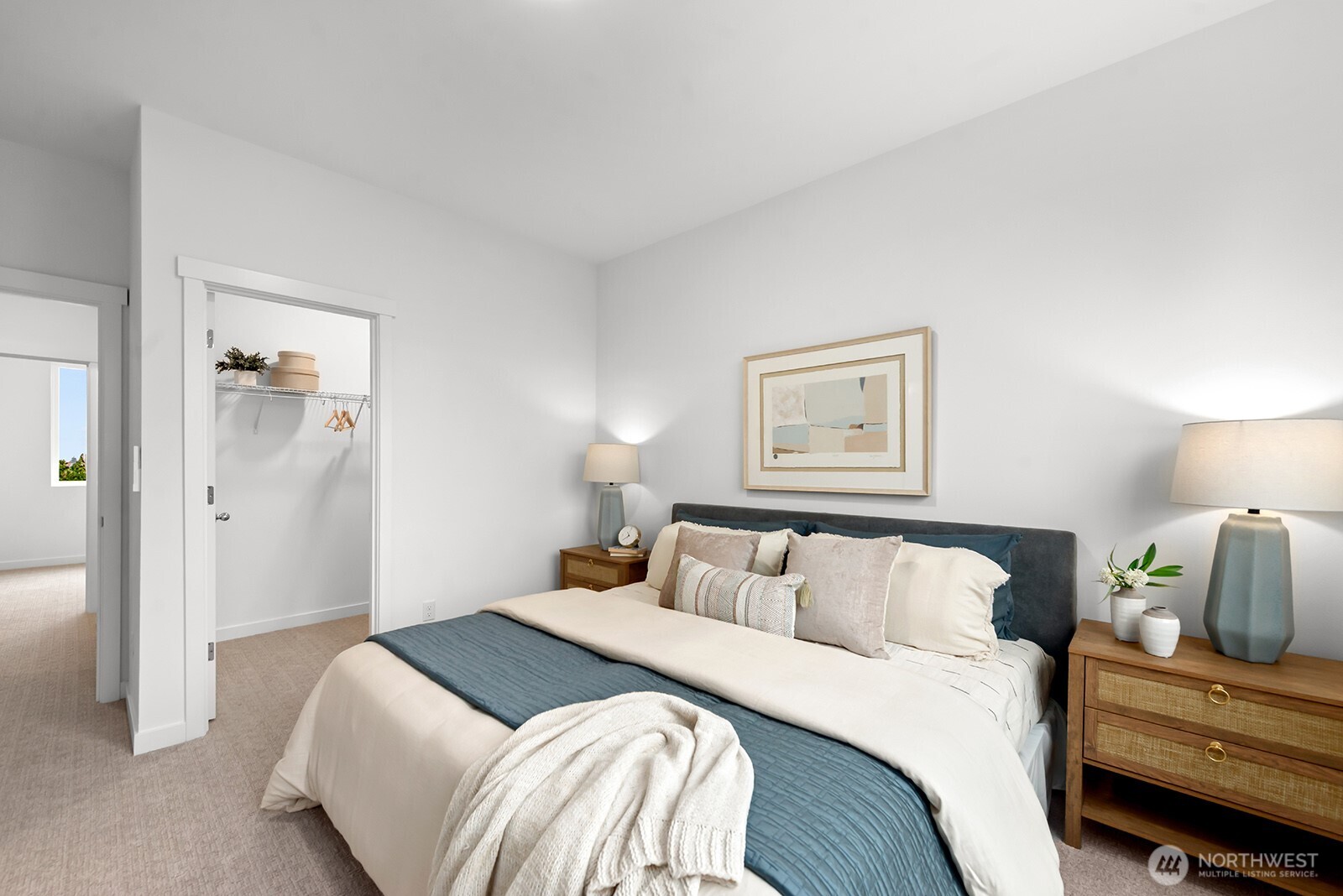 1417 Southwest 111th Lane Seattle, WA 98146 - Photo 12 of 19 a bedroom with a bed and a lamp