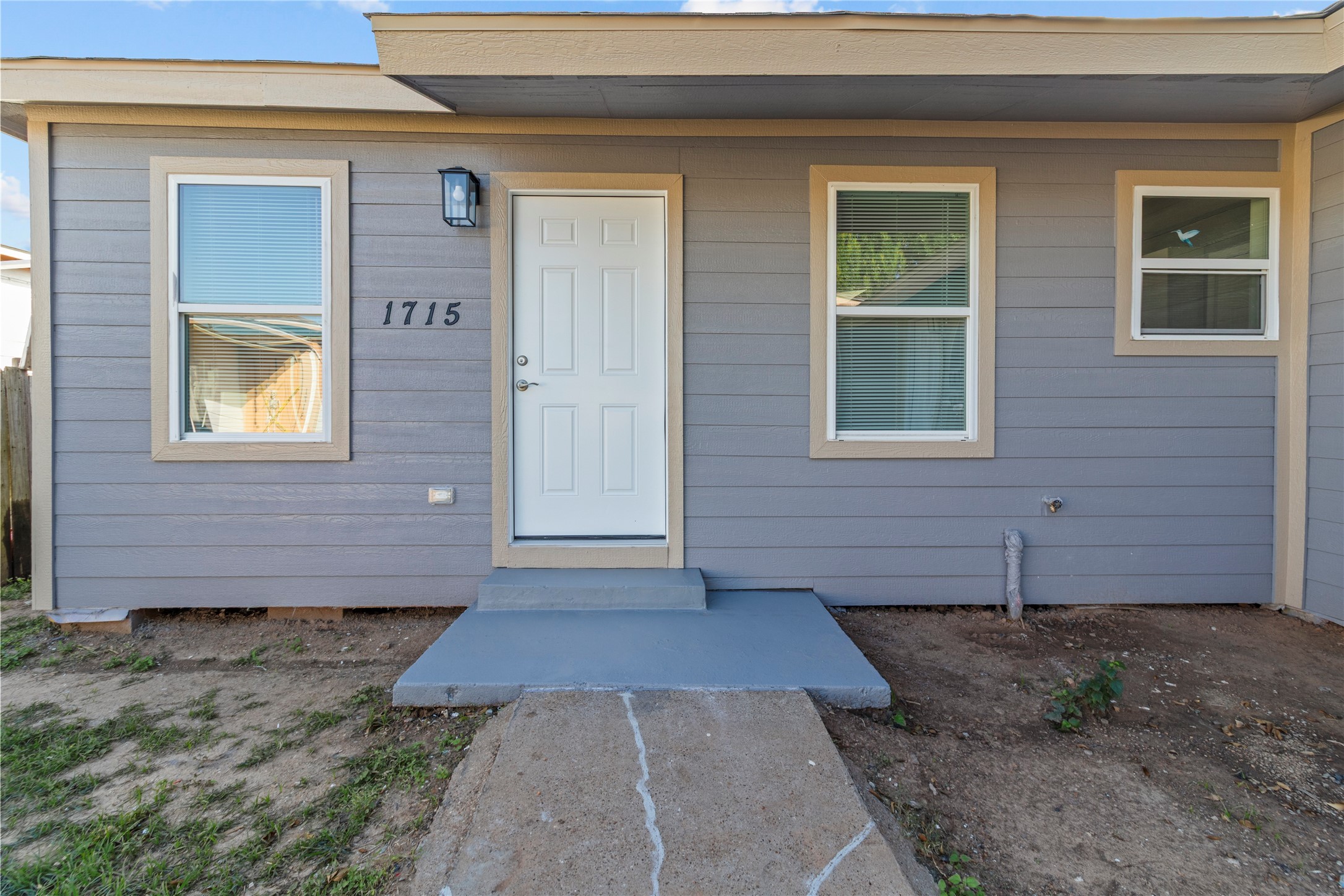 1715 West 4th Street Freeport, TX 77541 - Photo 1 of 9 a view of front door of house