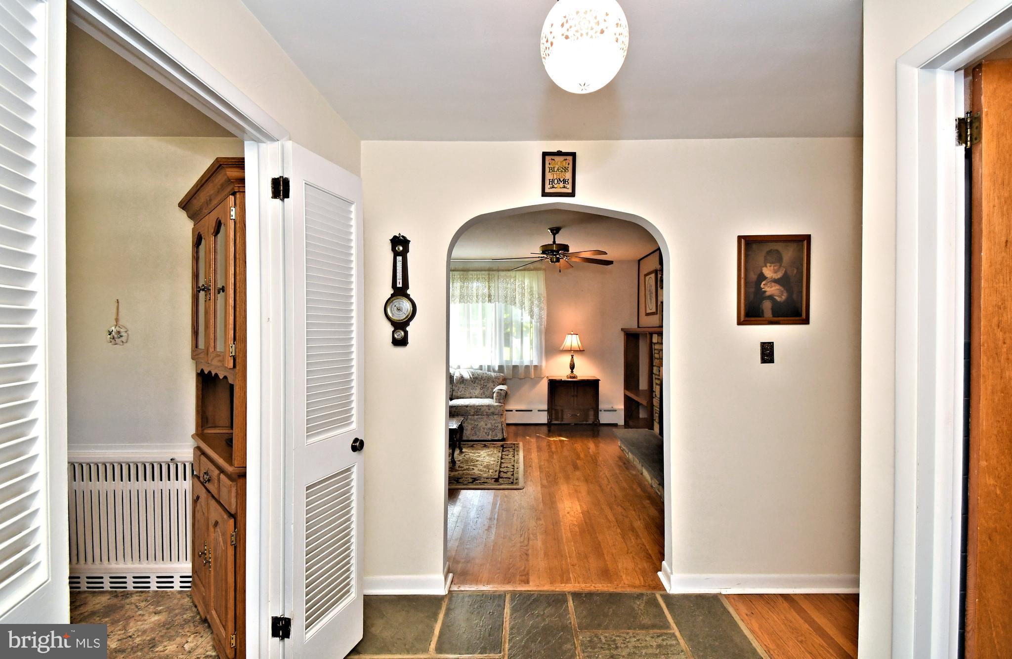 3020 Old Welsh Road Willow Grove, PA 19090 - Photo 3 of 28 Flagstone foyer with archway into living room