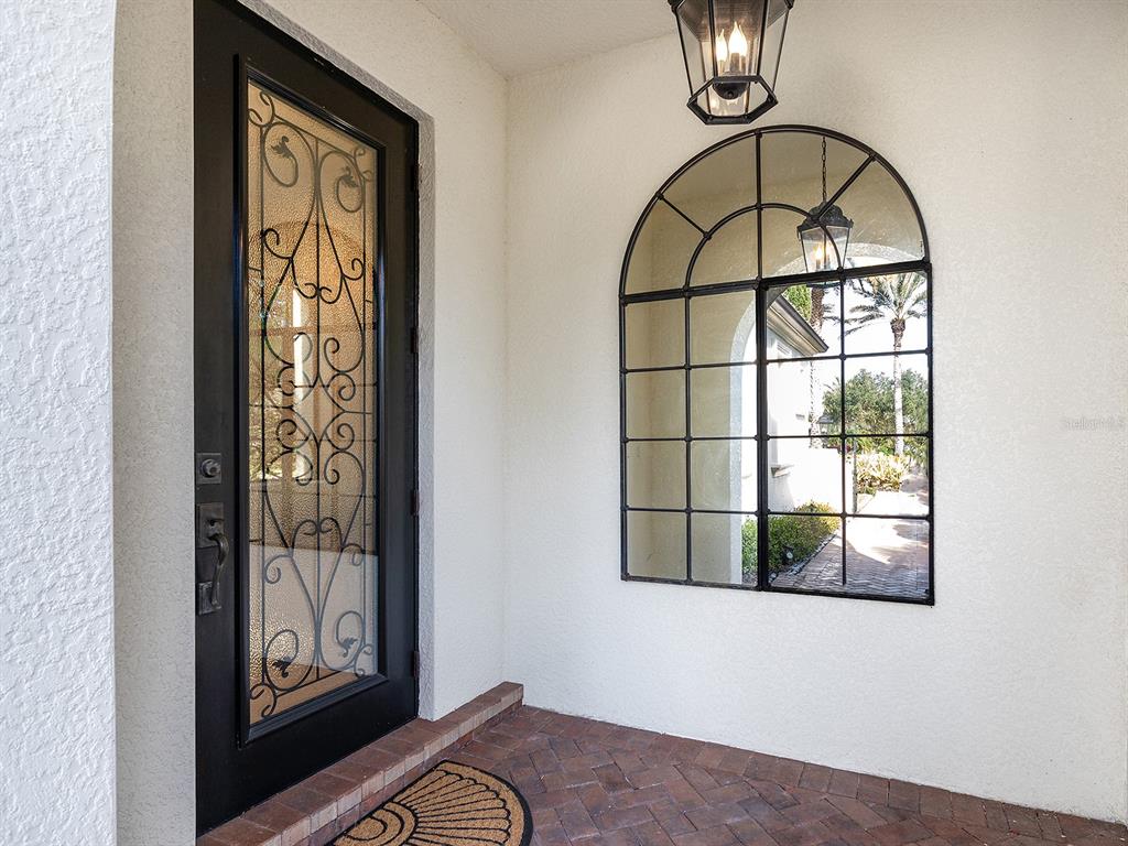 7951 Matera Court Lakewood Ranch, FL 34202 - Photo 11 of 81 a view of front door with a door