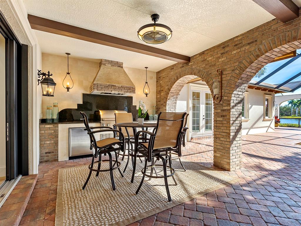 7951 Matera Court Lakewood Ranch, FL 34202 - Photo 47 of 81 a view of a dining room with furniture