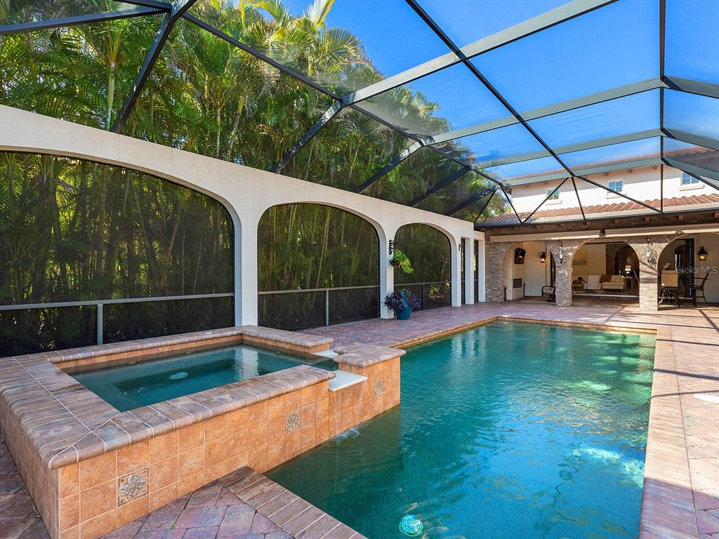 7951 Matera Court Lakewood Ranch, FL 34202 - Photo 56 of 81 a view of swimming pool with a patio