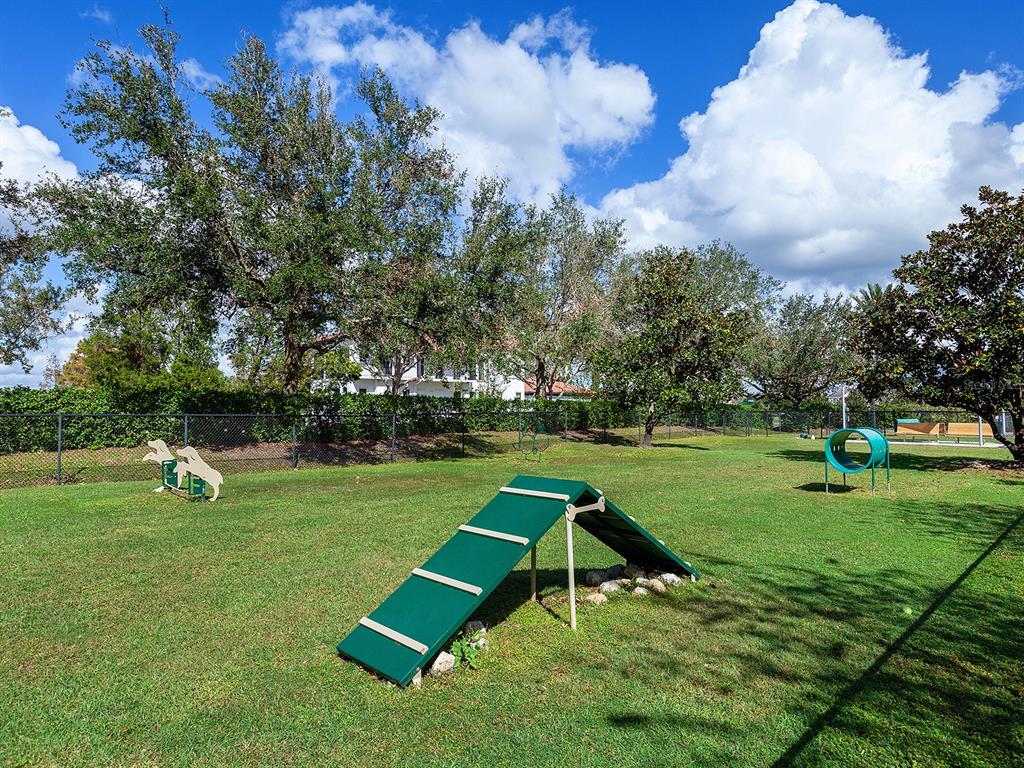 7951 Matera Court Lakewood Ranch, FL 34202 - Photo 71 of 81 a view of a park with slide
