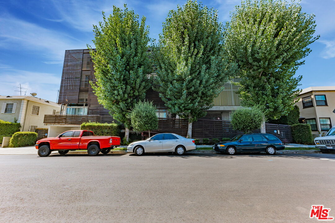 123 North Kings Road, Unit 11 Los Angeles, CA 90048 - Photo 25 of 27 a car parked in front of a house