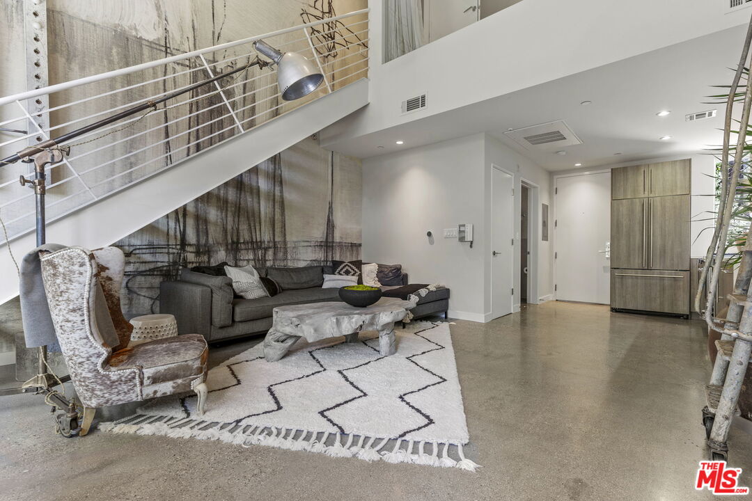 123 North Kings Road, Unit 11 Los Angeles, CA 90048 - Photo 6 of 27 a living room with furniture