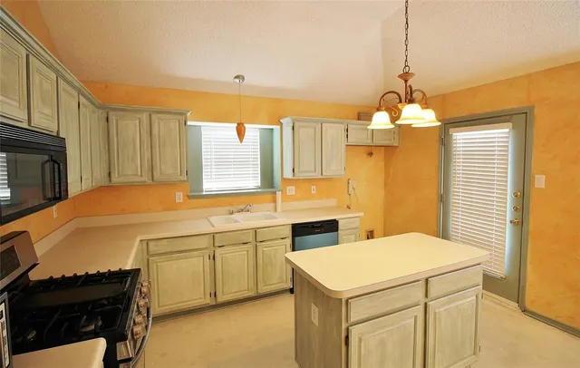 a utility room with washer and dryer