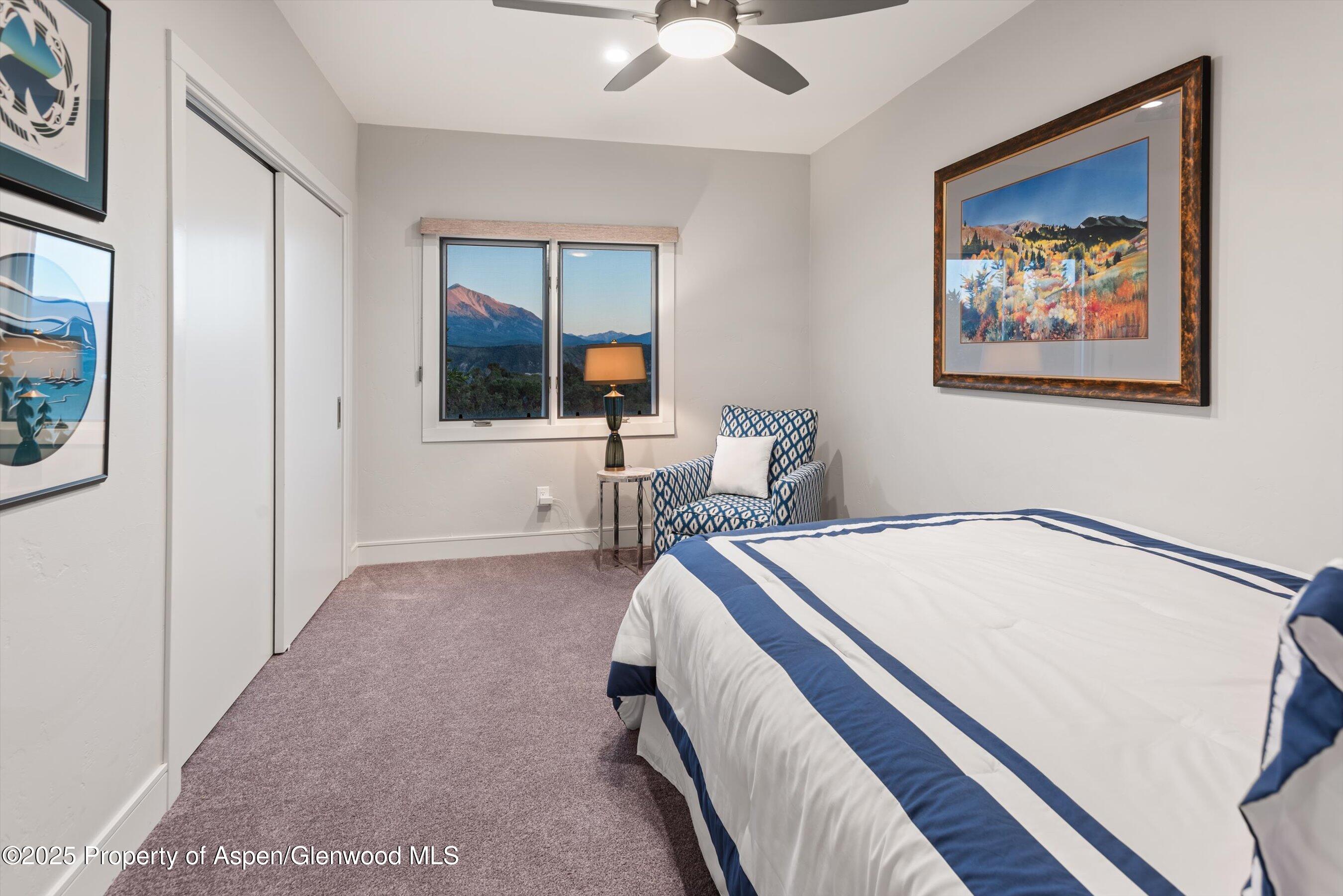 384 Wooden Deer Road Carbondale, CO 81623 - Photo 29 of 48 a bedroom with bed and window