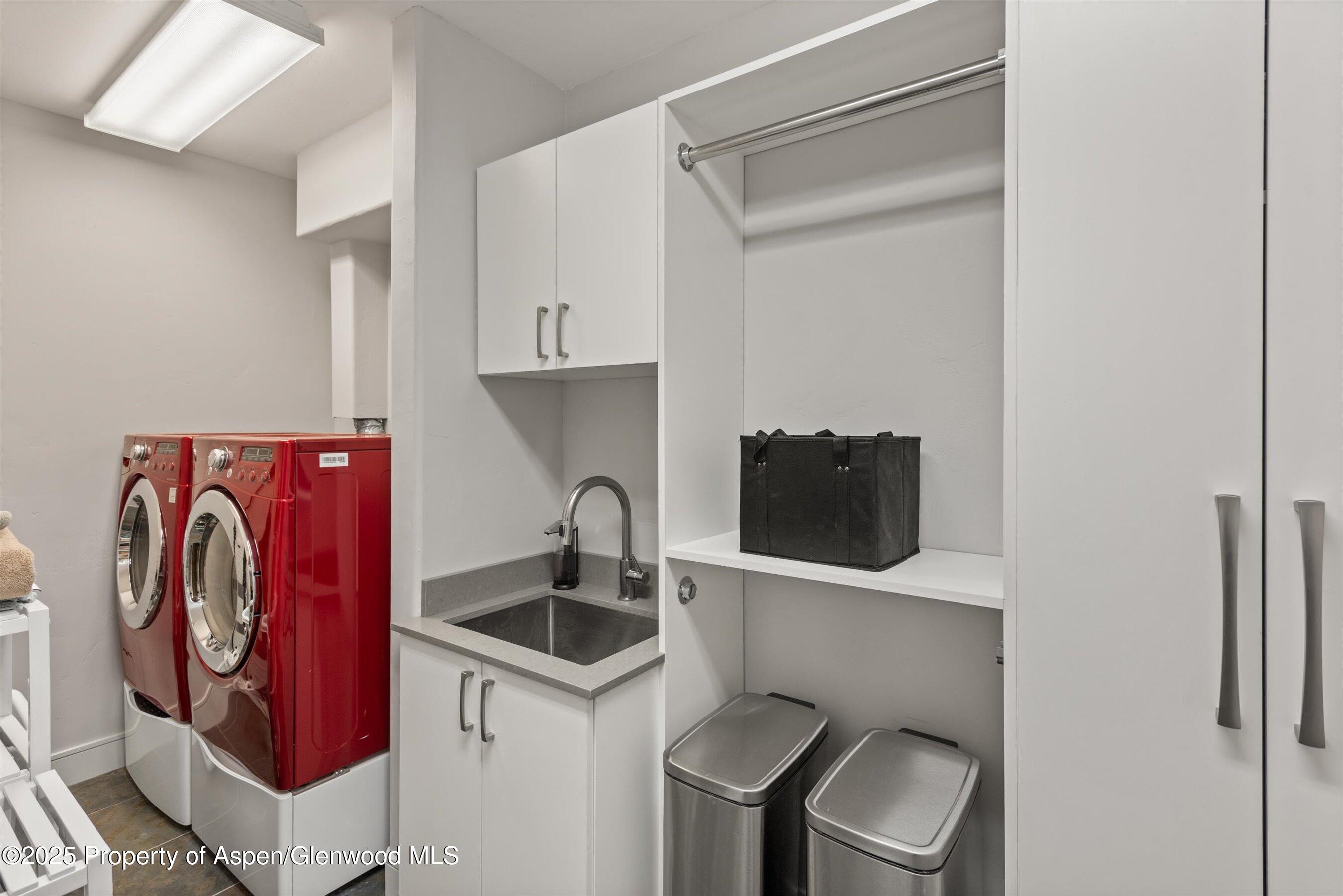 384 Wooden Deer Road Carbondale, CO 81623 - Photo 38 of 48 a kitchen with stainless steel appliances granite countertop a sink and a refrigerator