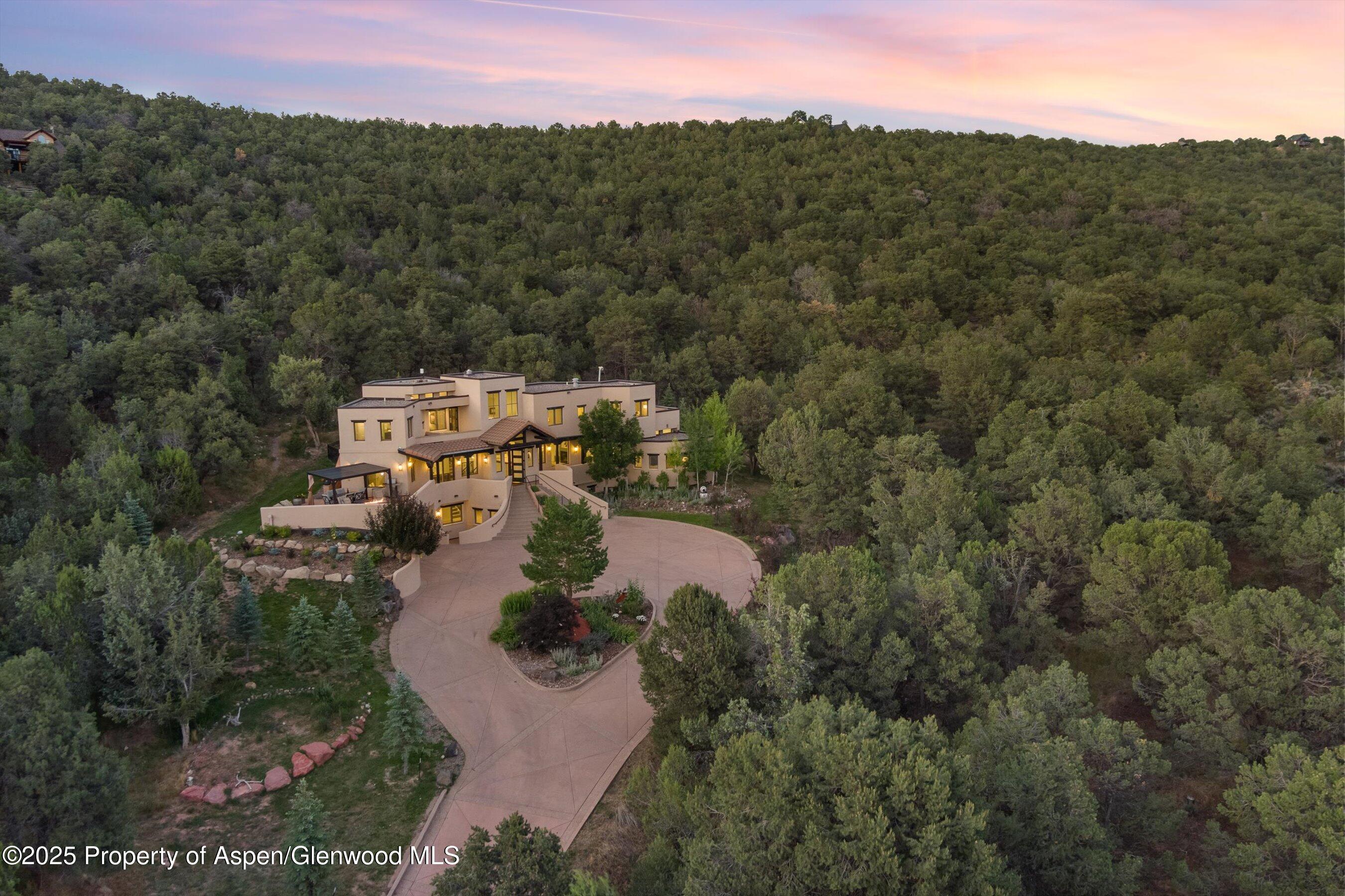 384 Wooden Deer Road Carbondale, CO 81623 - Photo 43 of 48 an aerial view of a house with a yard
