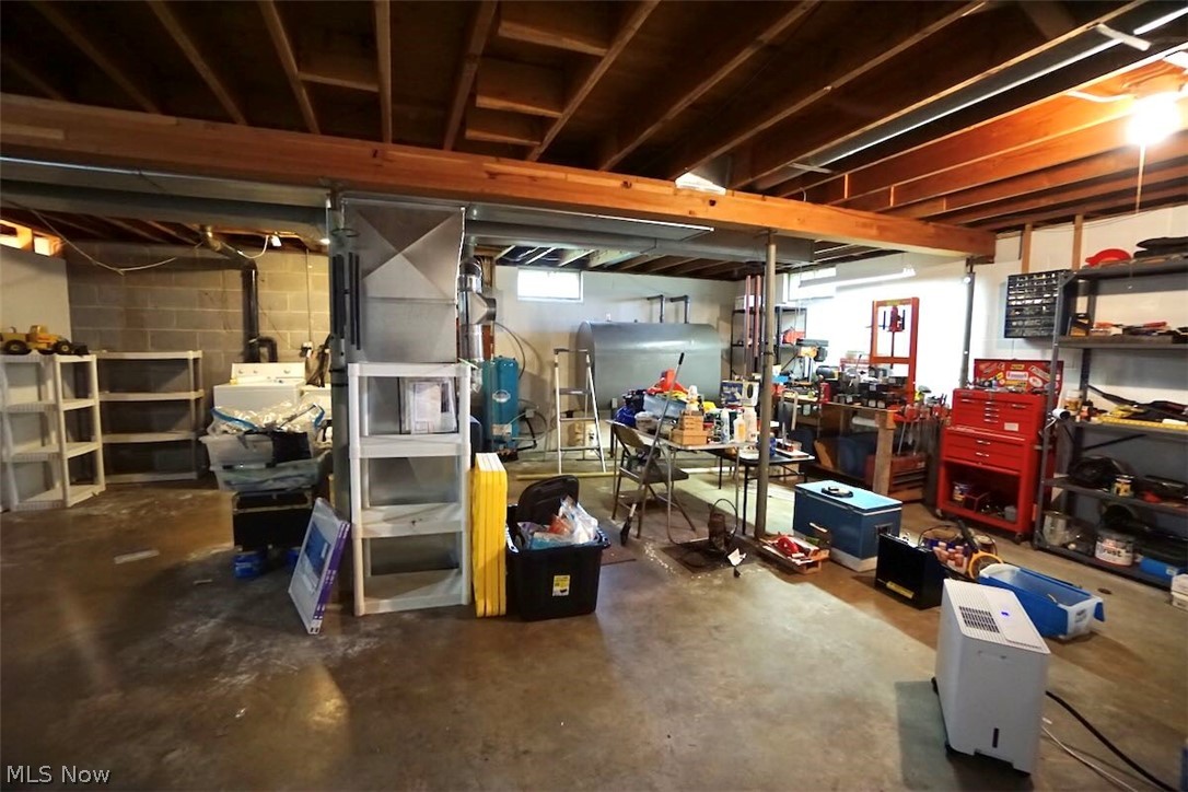 5875 Trumbull Road Geneva, OH 44041 - Photo 15 of 33 Lower level main room