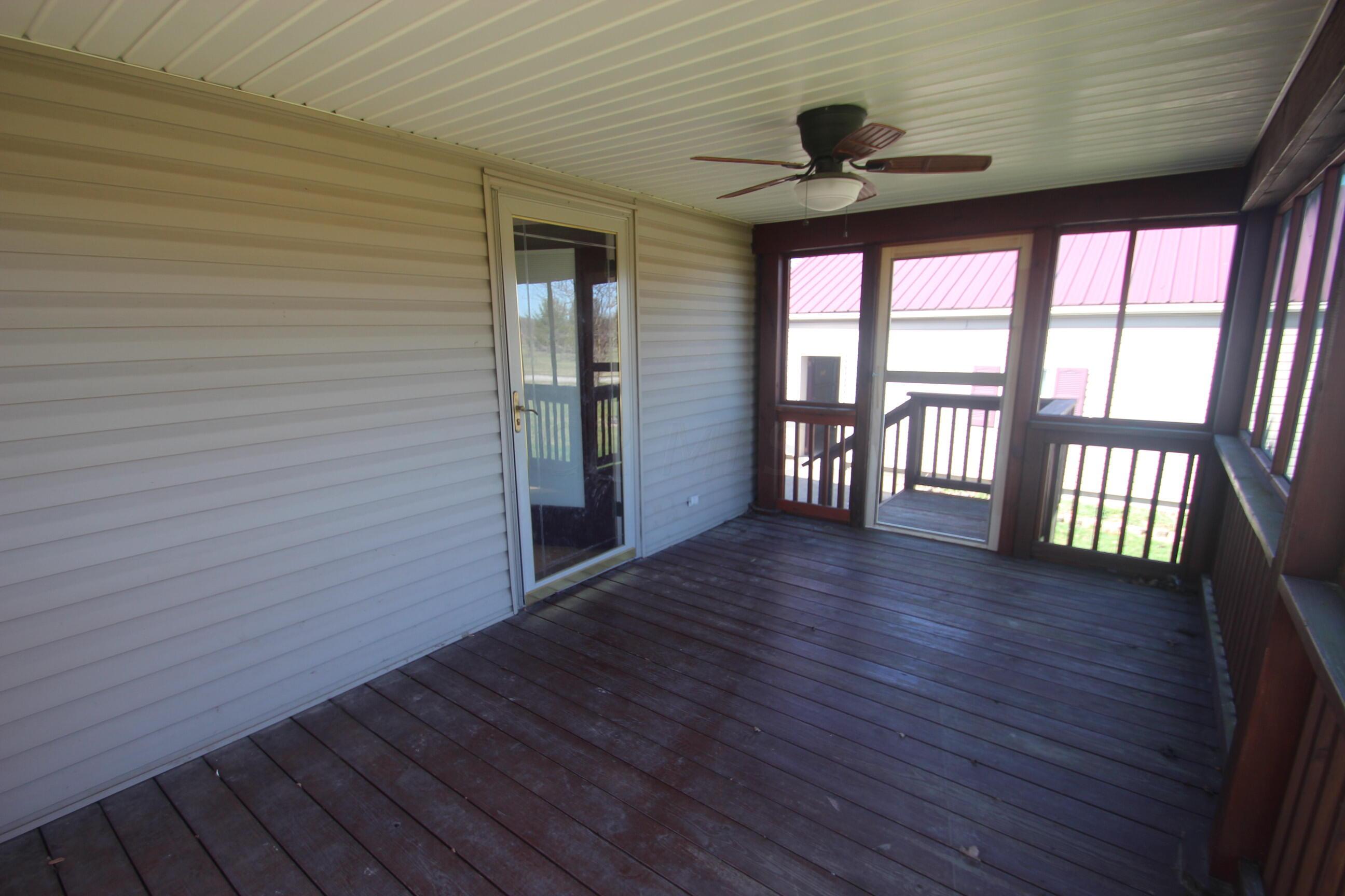 540 Newmans-Cardington Road West Prospect, OH 43342 - Photo 34 of 41 Screened in porch toward family room door.