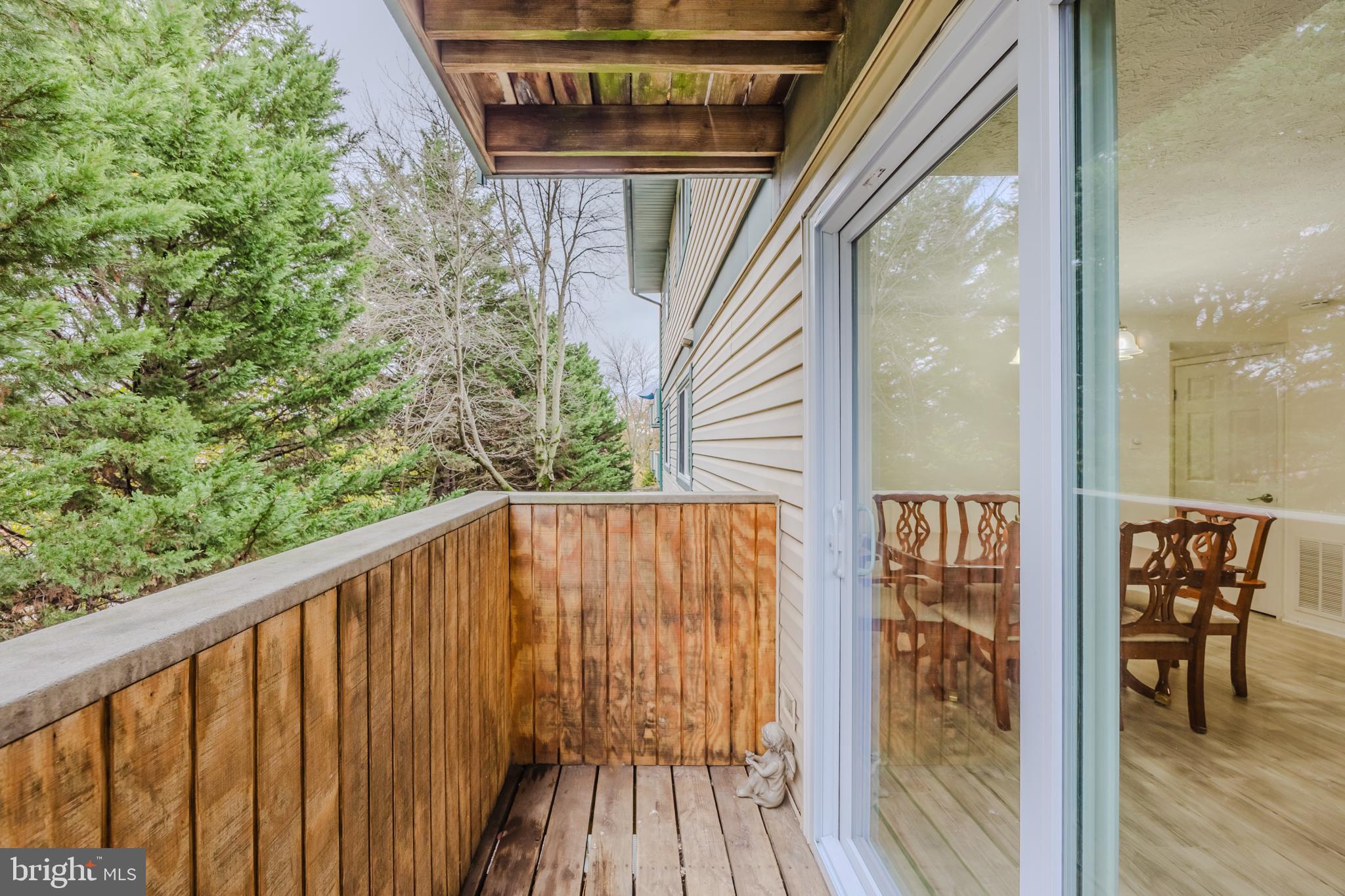 19621 Gunners Branch Road, Unit 823 Germantown, MD 20876 - Photo 31 of 49 a view of balcony with wooden floor