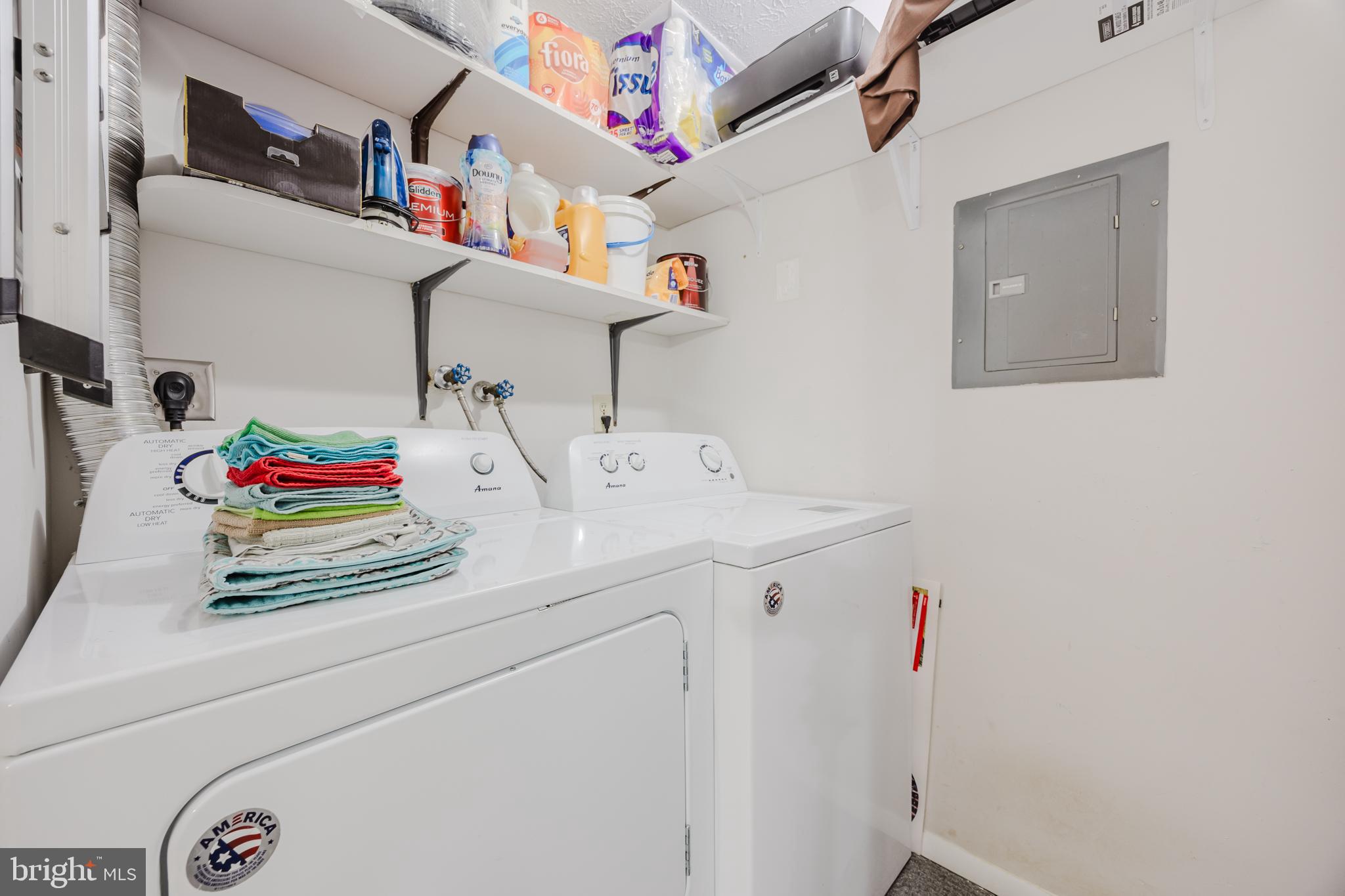 19621 Gunners Branch Road, Unit 823 Germantown, MD 20876 - Photo 40 of 49 a utility room with dryer and washer