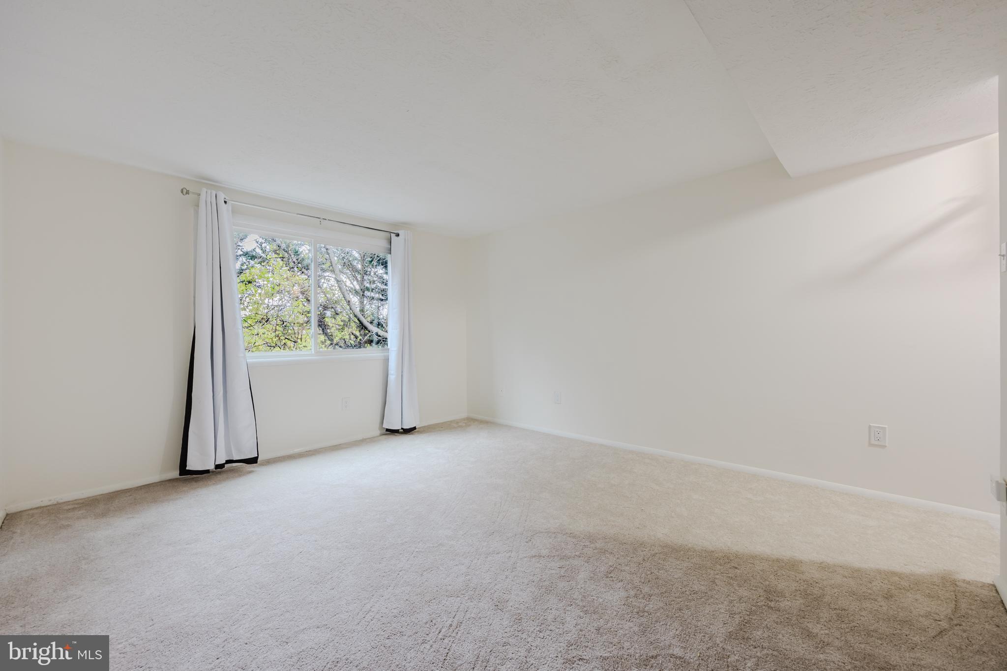 19621 Gunners Branch Road, Unit 823 Germantown, MD 20876 - Photo 47 of 49 a view of a room that has a window in it