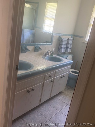 14 Richardson Road Bladenboro, NC 28320 - Photo 5 of 9 a bathroom with a sink and a mirror