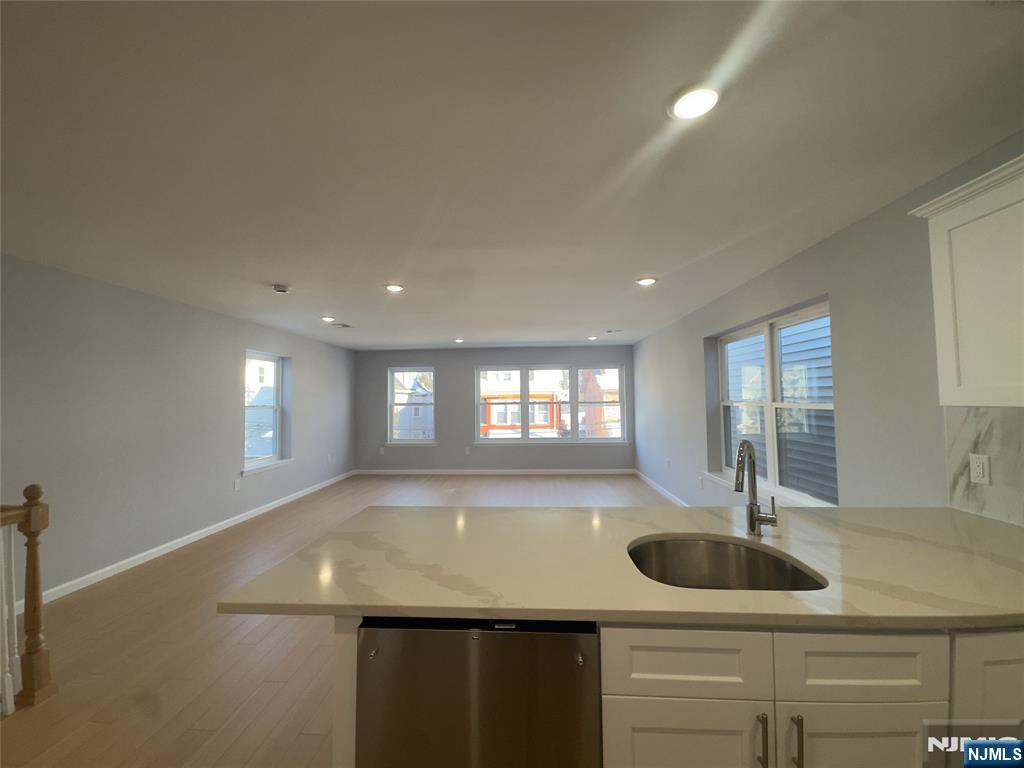 29 Isabella Avenue, Unit 2 Newark, NJ 07106 - Photo 11 of 35 a view of a kitchen with a sink and window