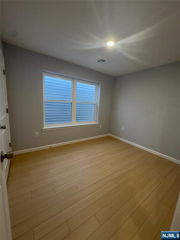 29 Isabella Avenue, Unit 2 Newark, NJ 07106 - Photo 18 of 35 an empty room with a empty space and window
