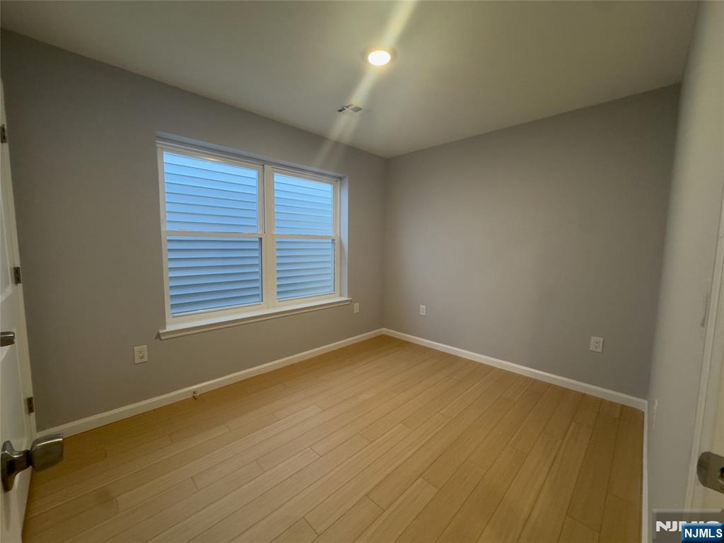 29 Isabella Avenue, Unit 2 Newark, NJ 07106 - Photo 19 of 35 an empty room with a window