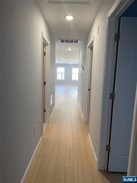 29 Isabella Avenue, Unit 2 Newark, NJ 07106 - Photo 35 of 35 a view of a hallway with wooden floor
