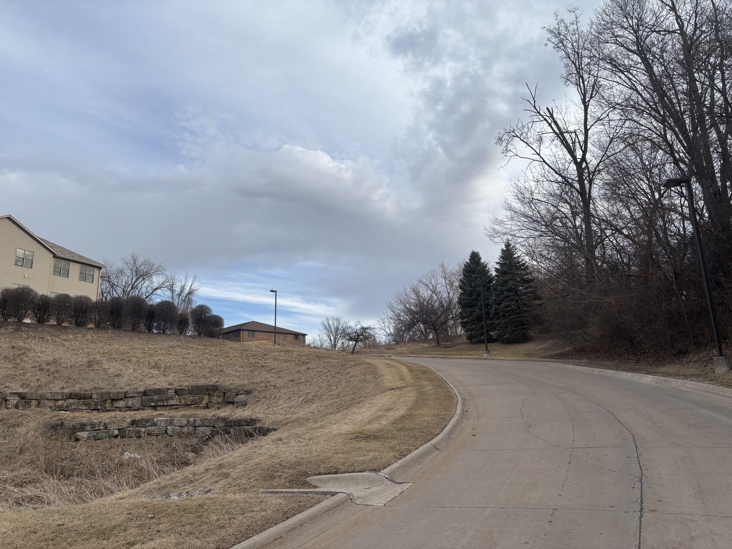 1251 Kimberly Road Bettendorf, IA 52722 - Photo 4 of 5 a view of a dry yard with wooden fence