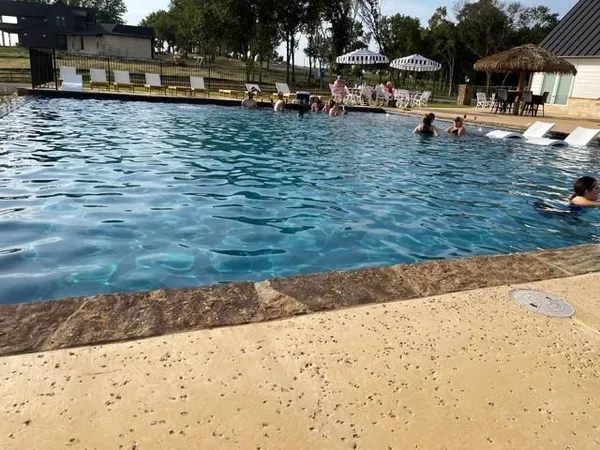 a view of a yard with cars