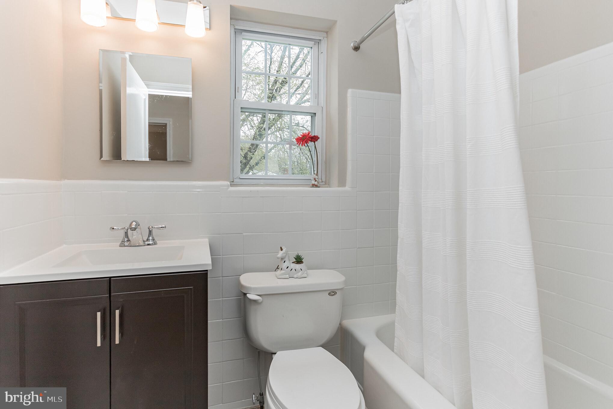 2010 Dayton Street Silver Spring, MD 20902 - Photo 21 of 30 Fresh and clean updated bathroom on the upper lvl