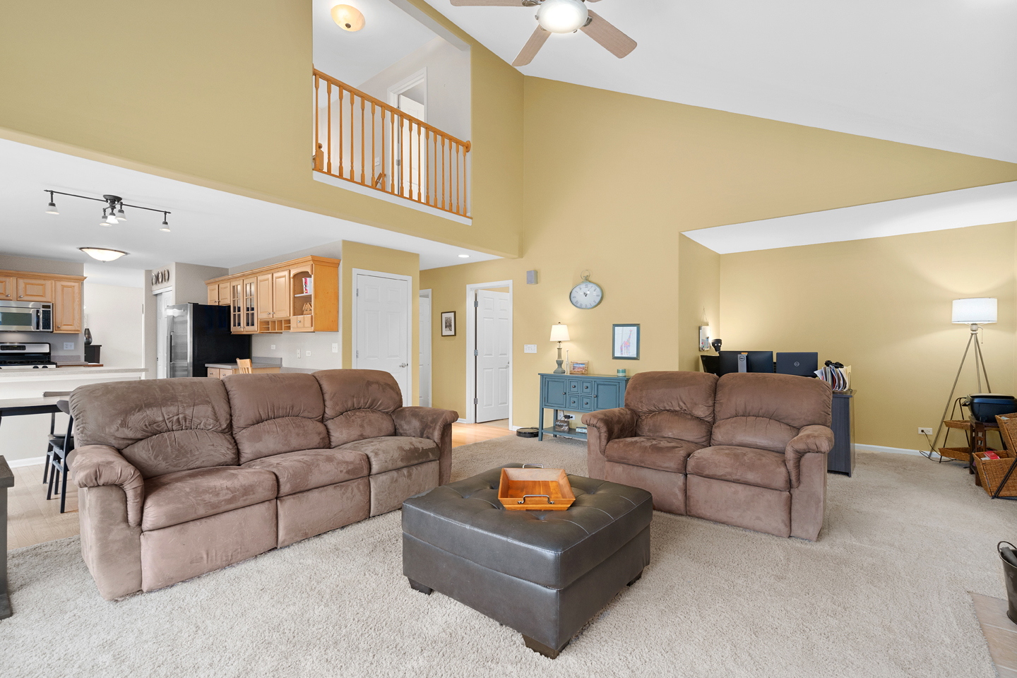 751 Sumac Drive Aurora, IL 60506 - Photo 15 of 33 a living room with furniture and a large mirror with wooden floor