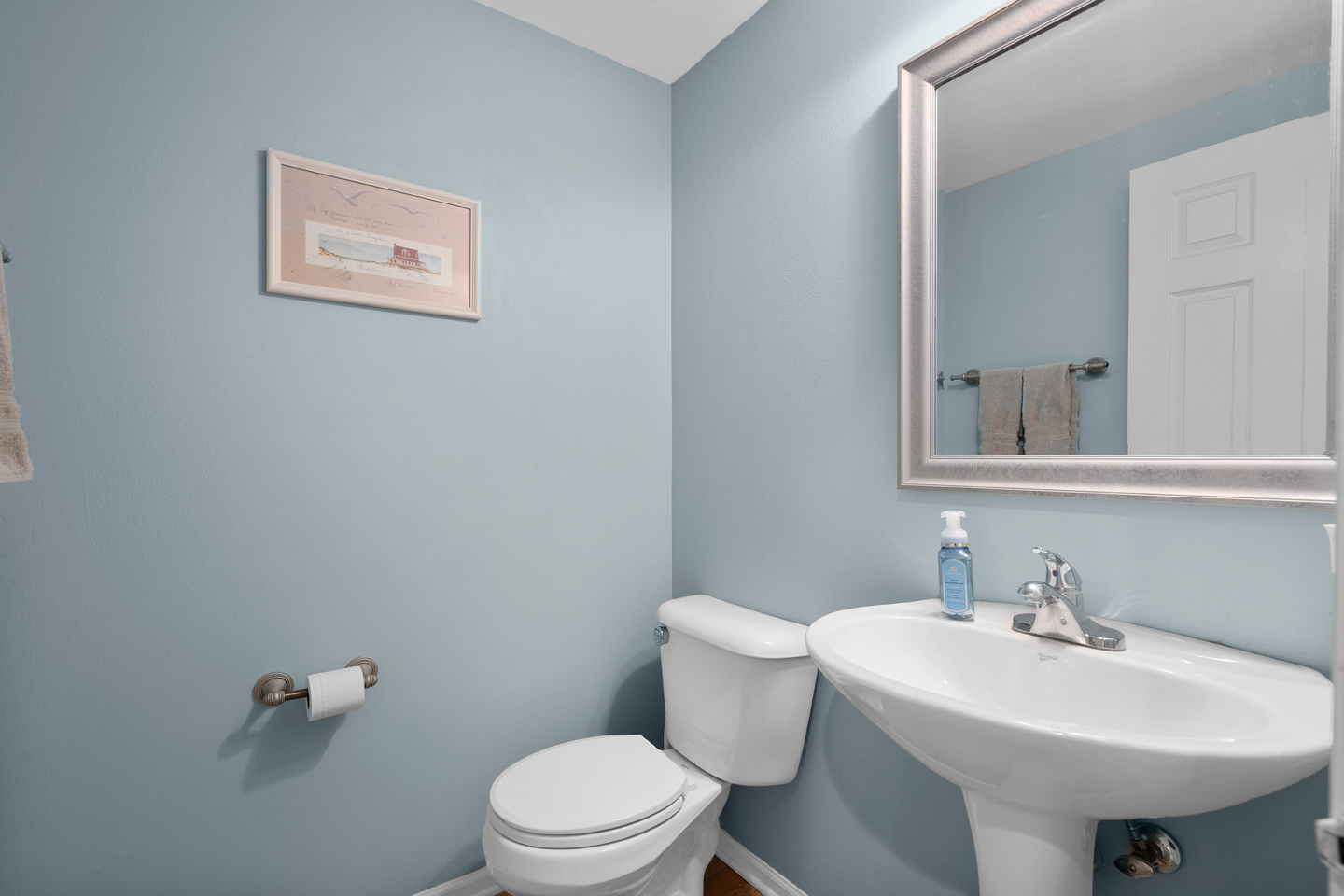 751 Sumac Drive Aurora, IL 60506 - Photo 17 of 33 a bathroom with a sink a toilet and mirror