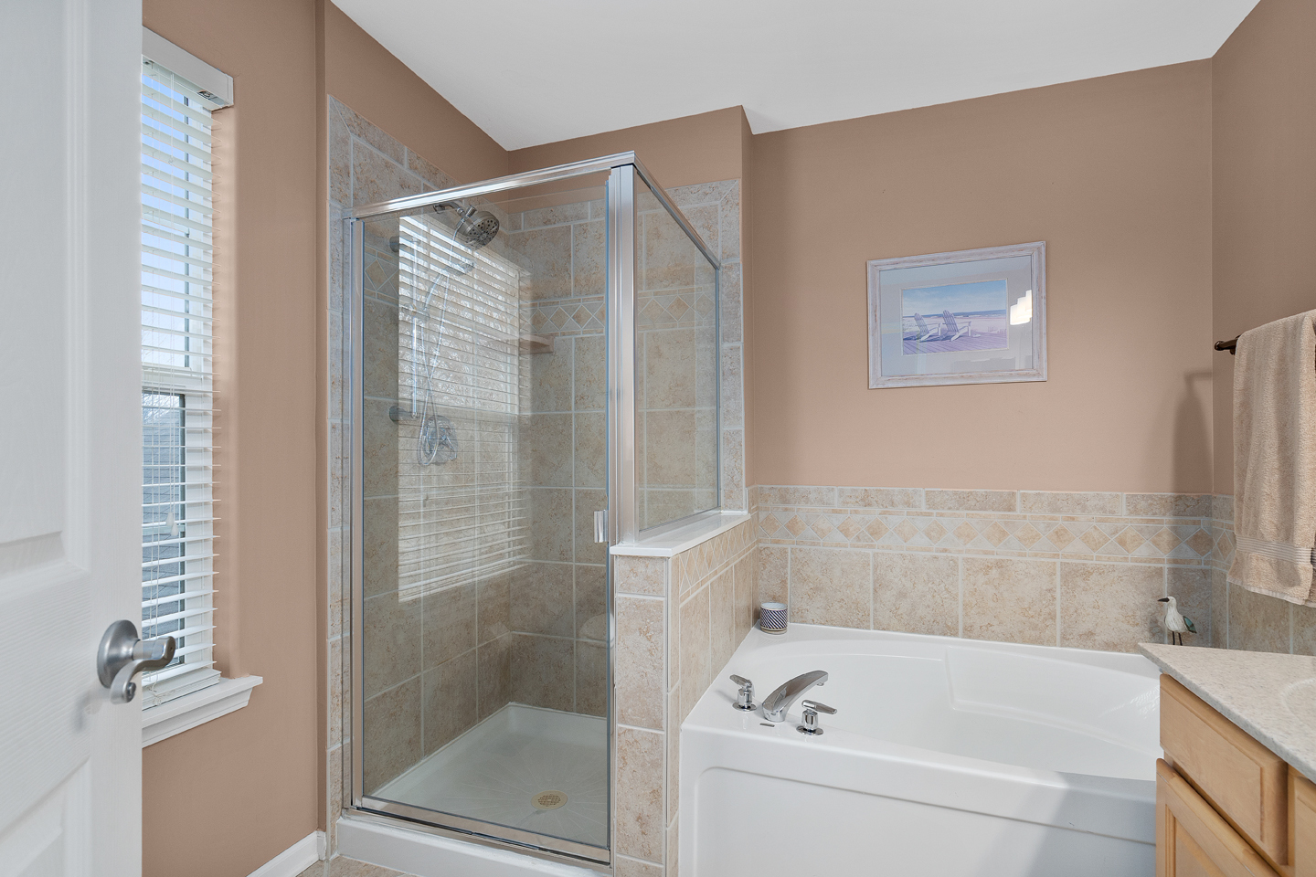 751 Sumac Drive Aurora, IL 60506 - Photo 22 of 33 a bathroom with a bathtub and a shower