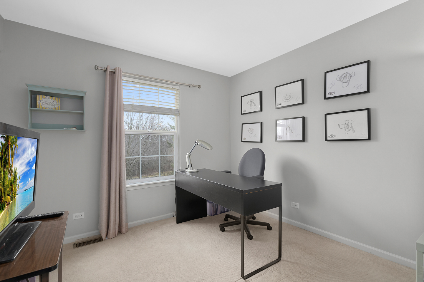 751 Sumac Drive Aurora, IL 60506 - Photo 23 of 33 a view of a workspace with furniture and a window