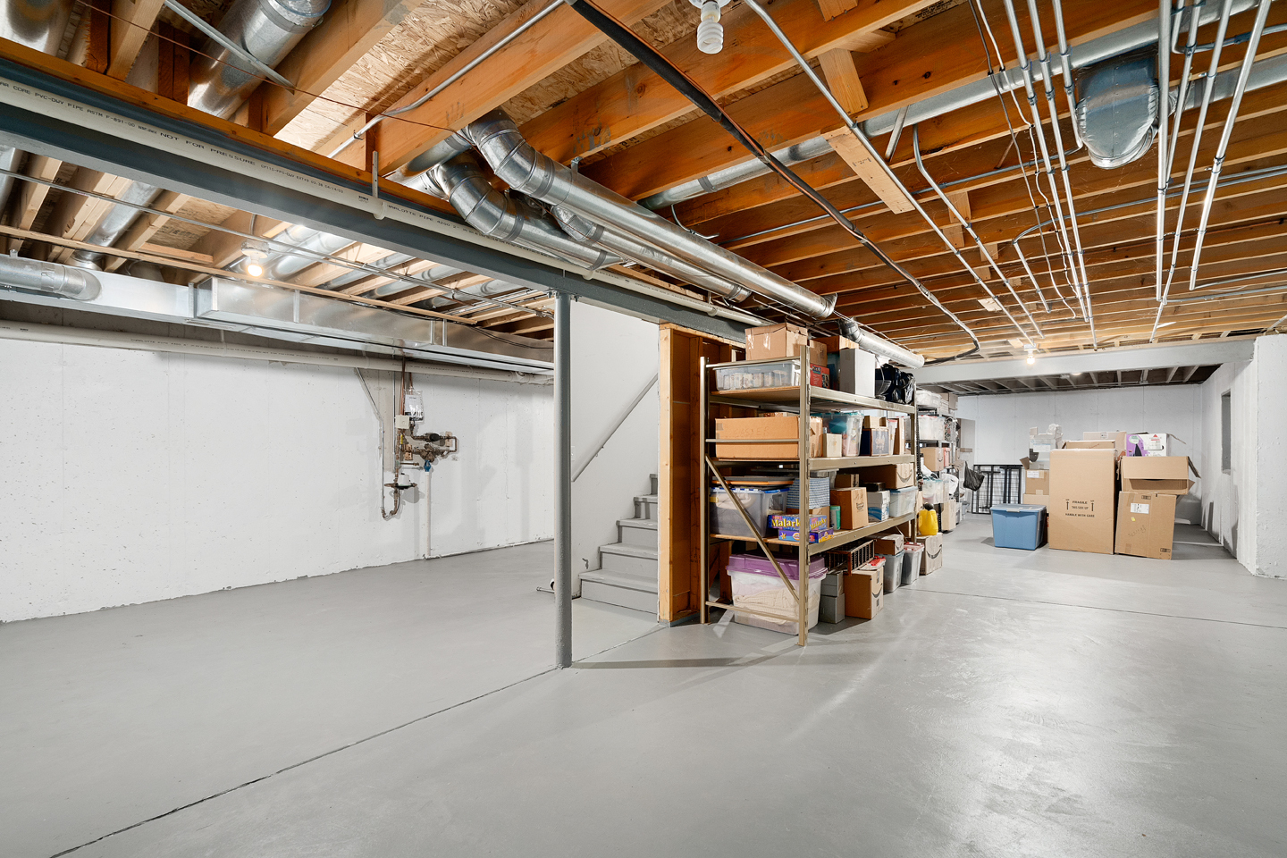 751 Sumac Drive Aurora, IL 60506 - Photo 26 of 33 a view of storage and utility room with stairs