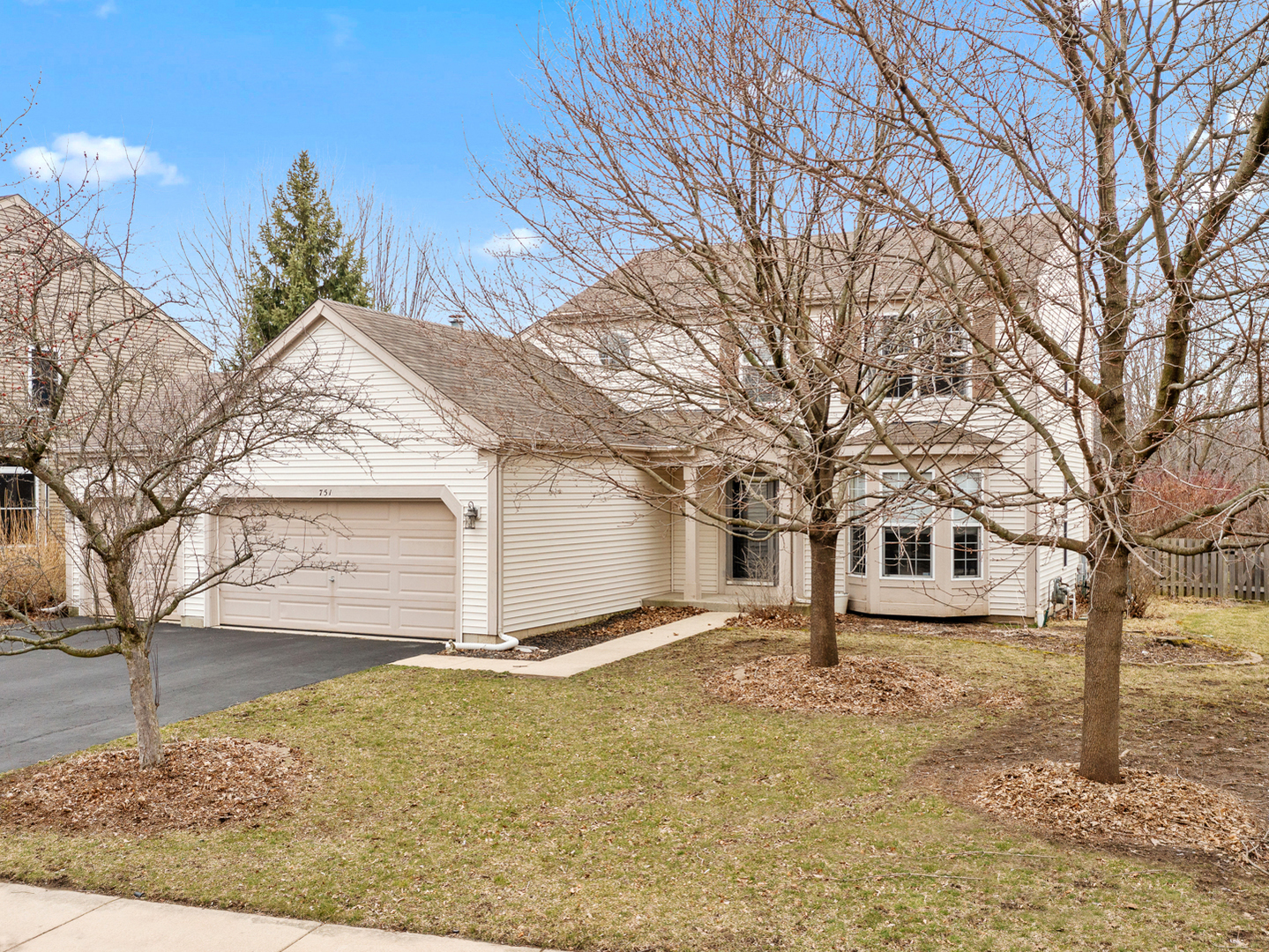 751 Sumac Drive Aurora, IL 60506 - Photo 30 of 33 a view of a house with a yard
