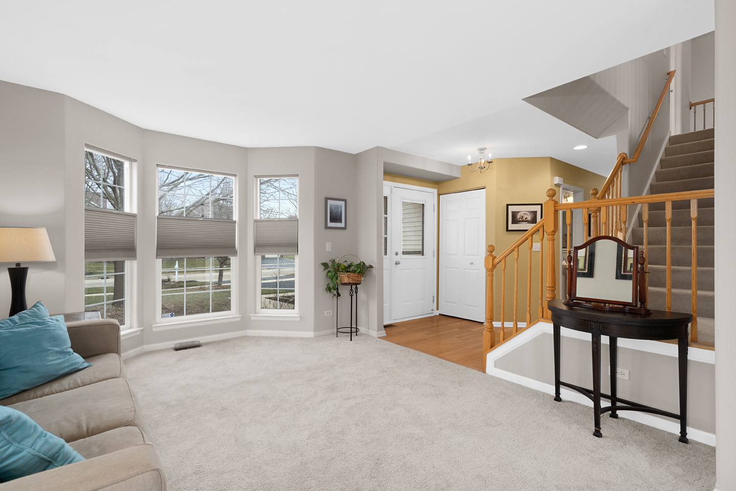 751 Sumac Drive Aurora, IL 60506 - Photo 6 of 33 a living room with furniture a window and a flat screen tv