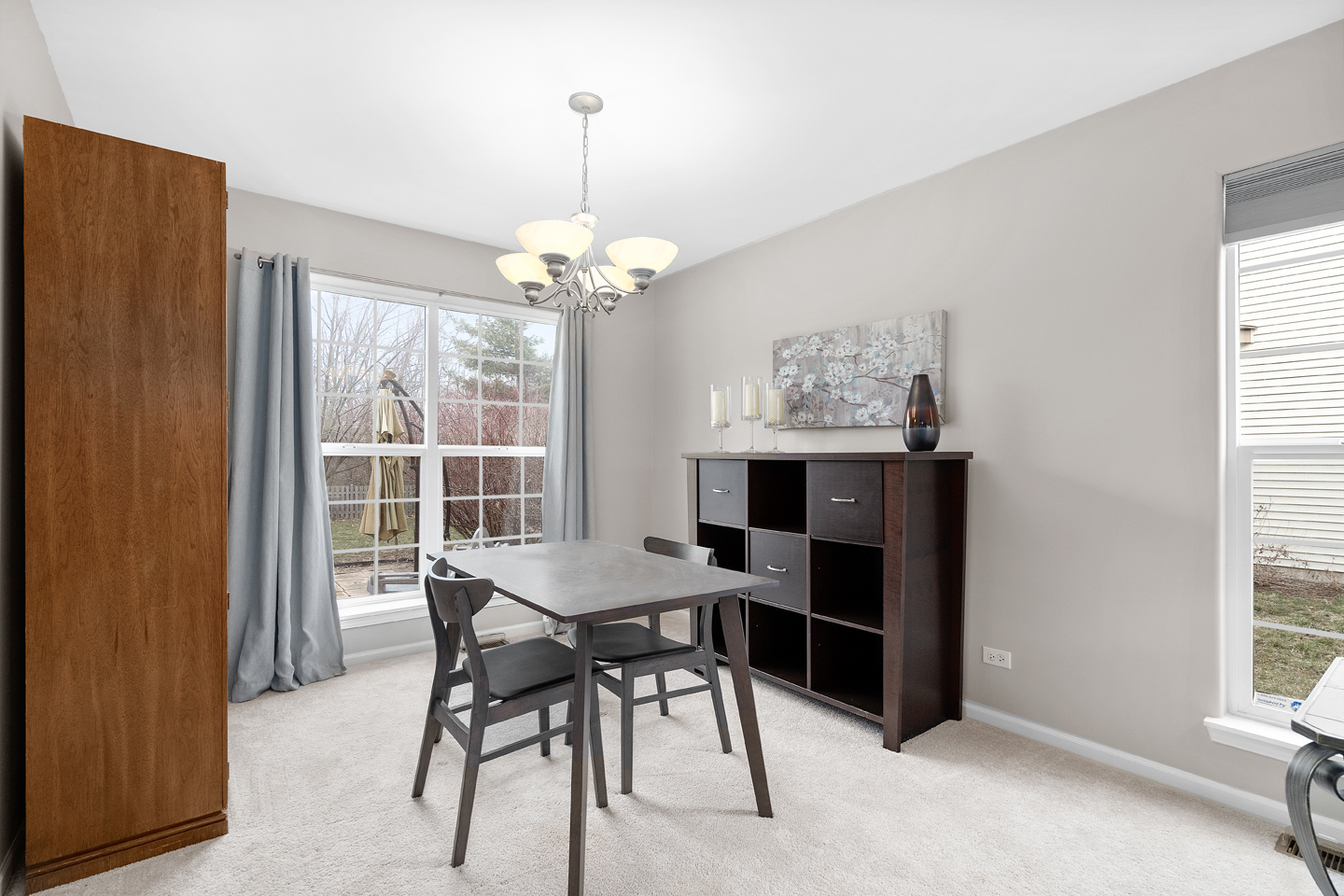 751 Sumac Drive Aurora, IL 60506 - Photo 9 of 33 a view of a dining room with furniture and window
