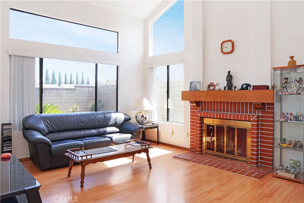 26 Appomattox Irvine, CA 92620 - Photo 3 of 19 a living room with furniture and a fireplace