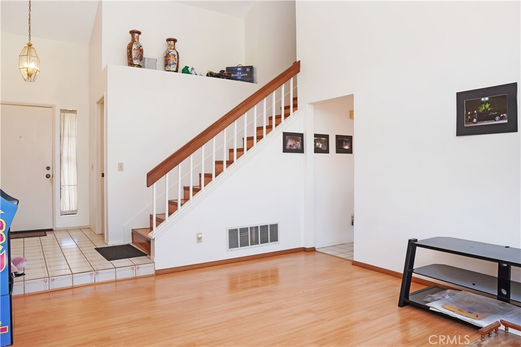 26 Appomattox Irvine, CA 92620 - Photo 5 of 19 a view of entryway and hall with wooden floor